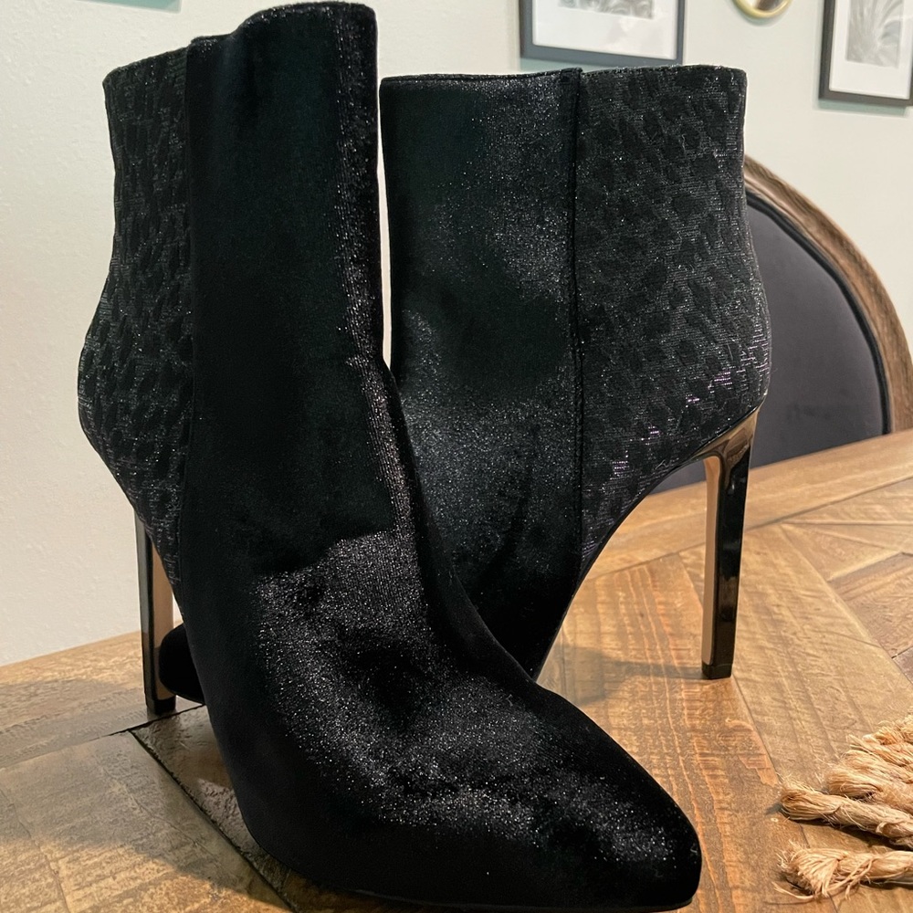 Nine West Animal Print Limited Edition Booties
Heel Boots